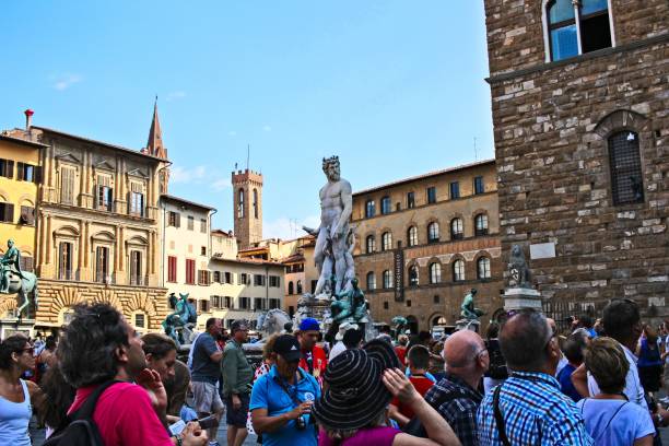 Overtourism in the city of Florence. This is an increasing problem in Europe Florence, Italy – July 13, 2019: Overtourism in the city of Florence. This is an increasing problem in Europe. michelangelo italy art david stock pictures, royalty-free photos & images
