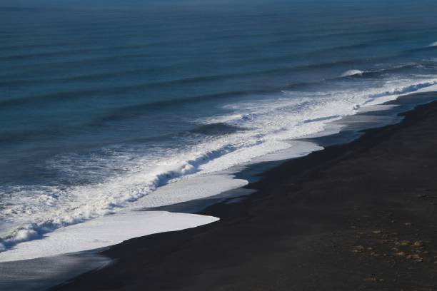istock Beach surrounded by the sea under the sunlight in Iceland 1439138059