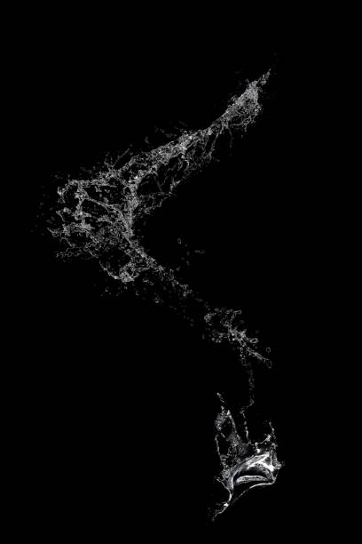 istock Wave-like water explosion against a black background 1439138626