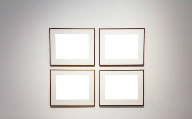 istock Square white surfaces attached to a wall in a room 1439140031