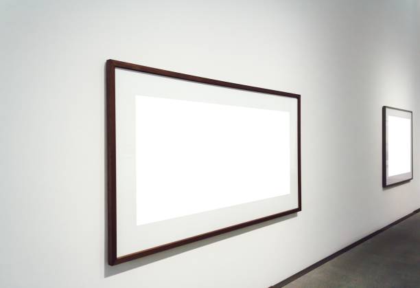 istock Square white surfaces attached to a wall in a room 1439140040