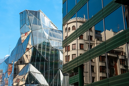 Beautiful shot of two glass buildings with abstract architecture in Bilbao, Spain