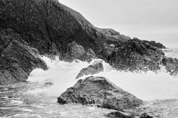 istock Beautiful view of ocean waves splashing on rocks 1439140969