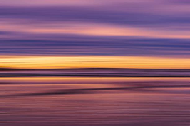 istock Beautiful beach during the purple sunset 1439143471