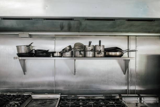 istock Shot of kitchenware containing silver pots, pans and stoves 1439143799