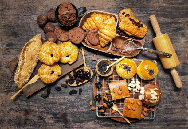 istock Various types of bakery and bakery equipment put on a wooden table 1439146640