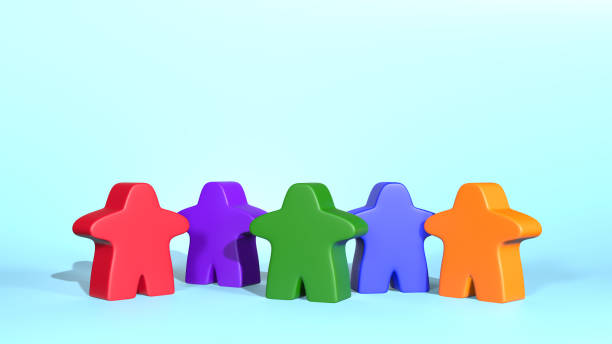 istock Different coloured meeple on pale blue background 1439148591