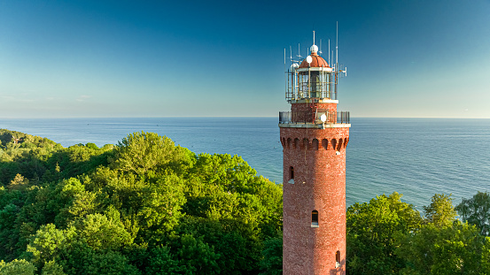 Lighthouse by Baltic Sea in summer, Aerial view of Poland, Europe
