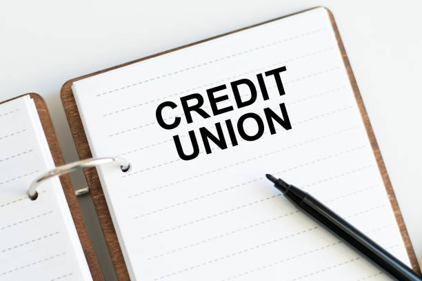 istock Credit Union text on an open sheet of notepad on the table 1439155750