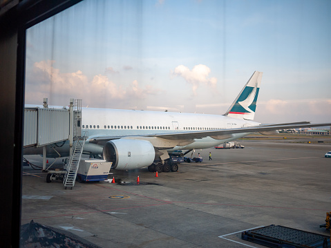 Taipei, Taiwan - October, 2012: an aircraft at terminal, view from gate of airport