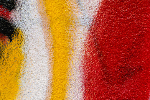 close up of colorful painted wall