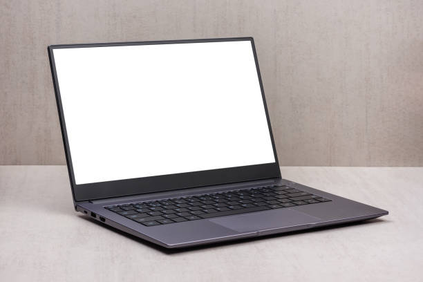 istock white mock up on a laptop screen on a gray background close up with clipping path 1439161155