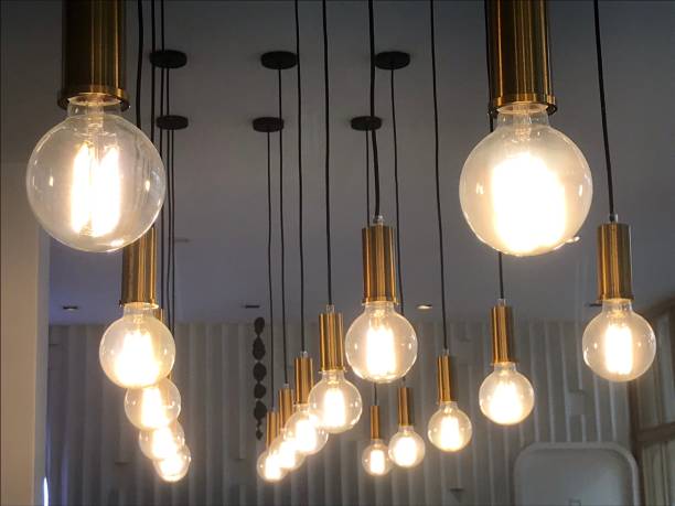 istock Modern electric lamp hanging in room 1439161500