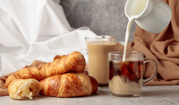 istock Croissants and coffee with cream. 1439161511