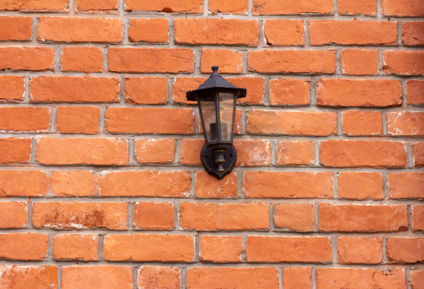 istock Vintage street lamp on a brick wall. 1439161533