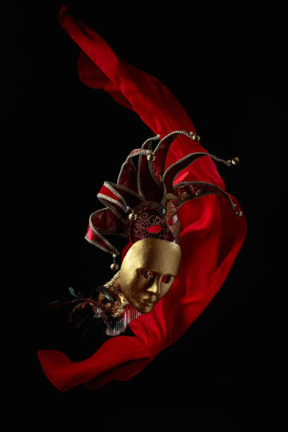 istock Old carnival masks with flutters red cloth. 1439161581