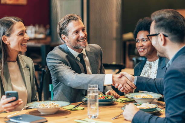 istock Business handshake at the restaurant 1439162186