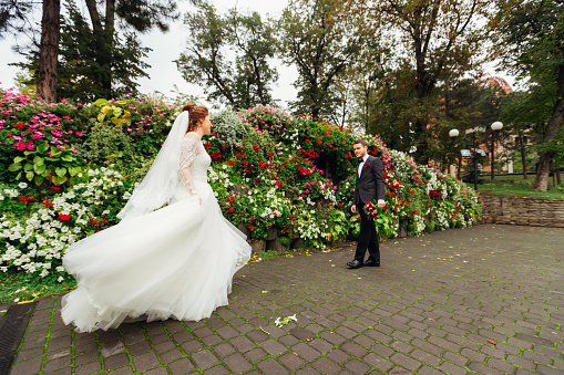 bride and groom kissing in nature.