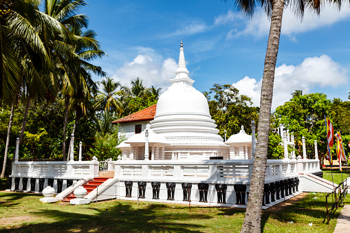 Exterior of a white Buddhist pagoda in Negombo, Sri Lanka, Asia