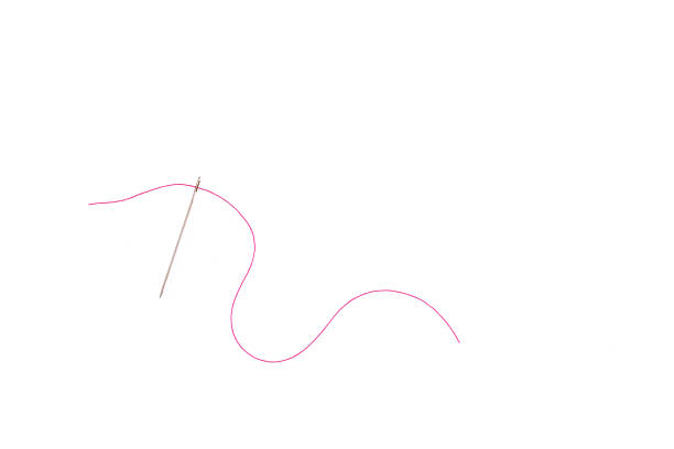 istock needle and thread of red color on a white background 1439165723