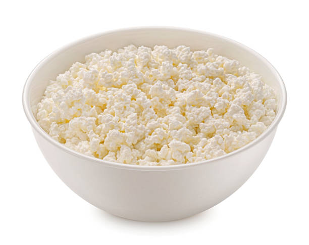 istock Bowl of cottage cheese isolated on white background 1439169903