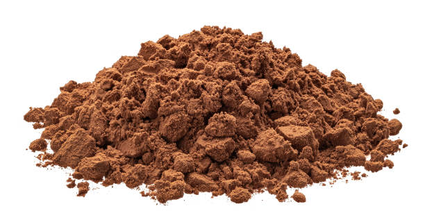 istock Pile of cocoa powder isolated on white background 1439169942