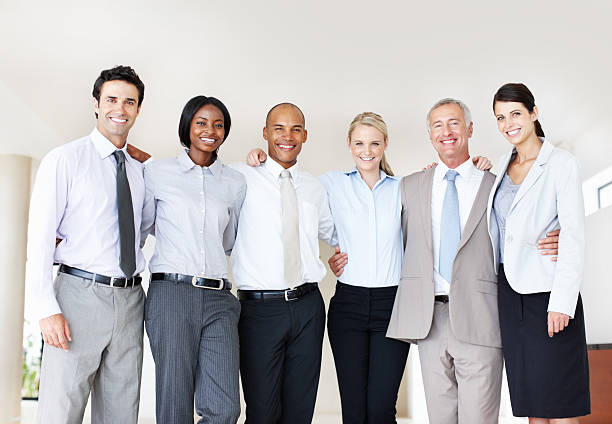 istock Business people standing in a row 143917039