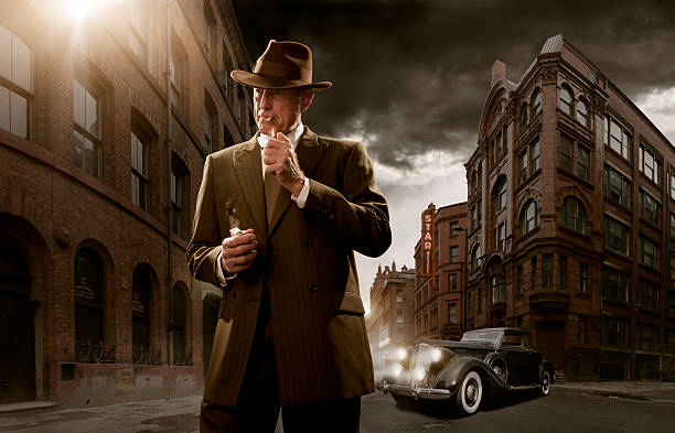 1940's Stylised Film Noir Gangster 1940's stylised film noir gangster / detective in city with car in background organized crime photos stock pictures, royalty-free photos & images