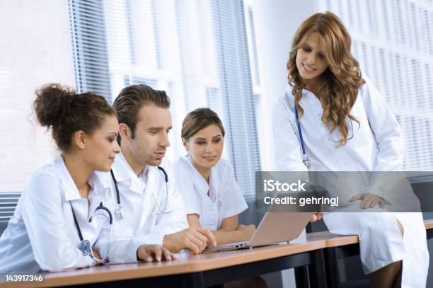 Group Of Young Doctors Stock Photo - Download Image Now - 20-24 Years, Adult, Adults Only