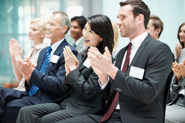 istock Happy business people clapping after good presentation 143917483