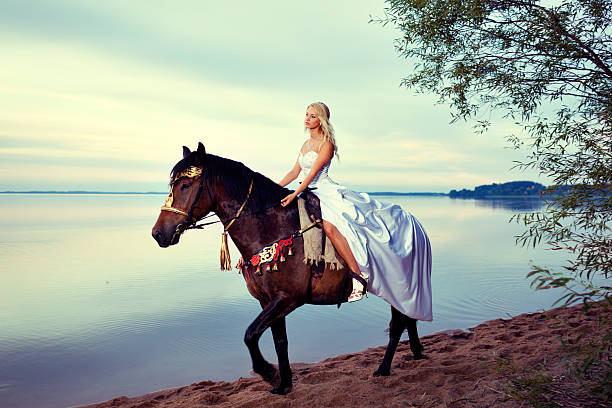 Young Woman Enjoying a Summer Day With Her Horse