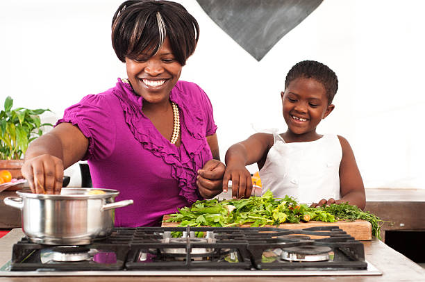 istock Mother and daugter cooking 143917745