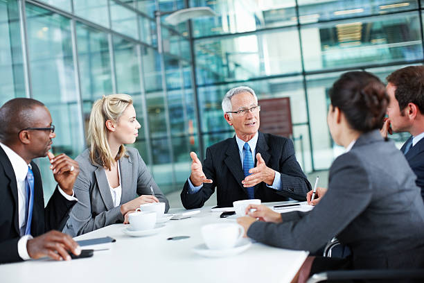 istock Leader expressing views to associates 143917882