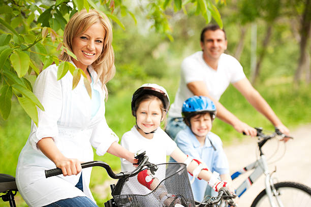 istock Cheerful family riding bicycles. 143917931