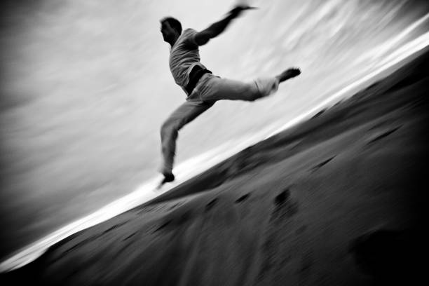 istock Jumping off of a dune 143918320