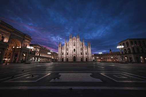 Amazing shot of the Duomo di Milano's amazing architecture on a night sky background