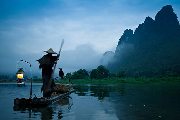istock Fishermen  fashing on Li River 143918699