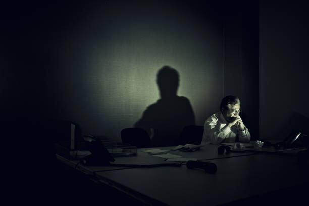 istock stressed businessman sitting alone in his office 143918775