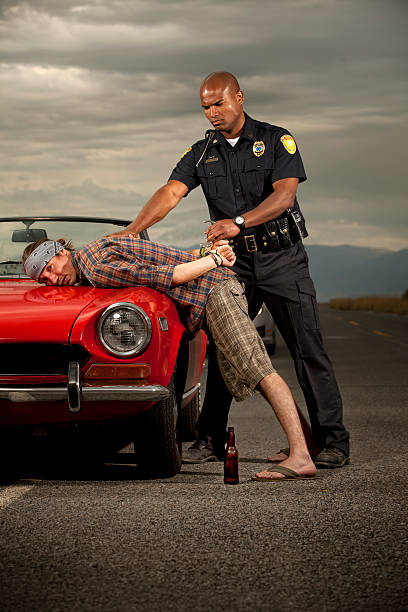 istock Officer Arrests a Caucasian Male 143918836