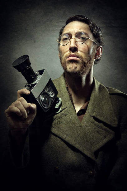 istock Dramatic Vintage Portrait of Man with Video Camera 143918985