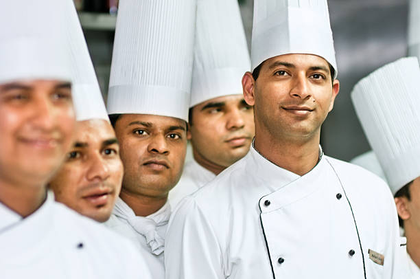 man in chef uniform kitchen supplies professional service. High quality photo