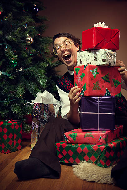 istock Christmas Nerd Child with Many Gifts 143919084