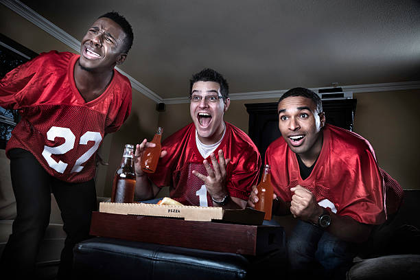 istock Friends watching Football on TV 143919086