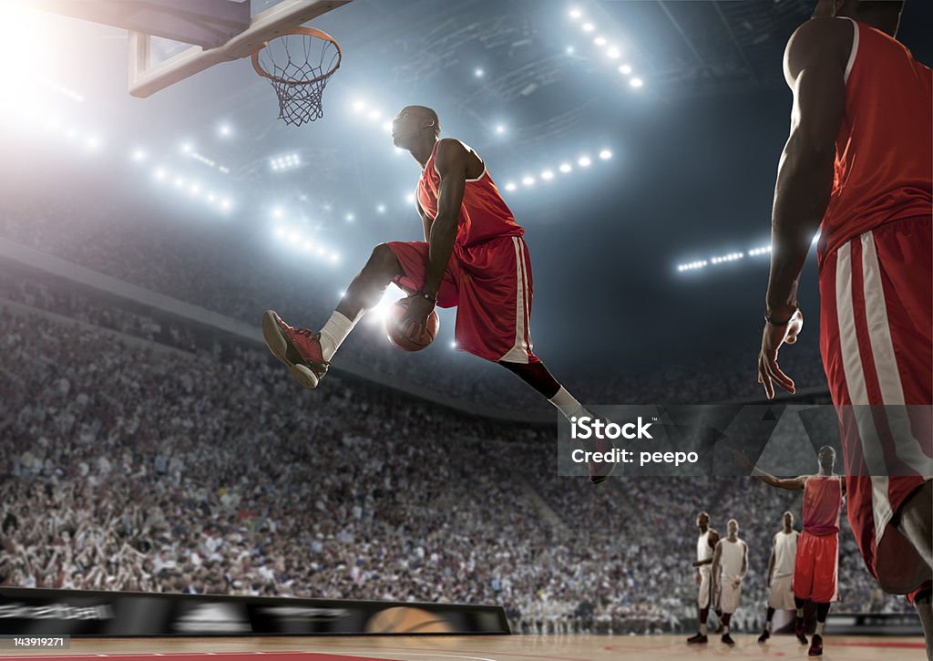 Jogador de basquete em ação - Foto de stock de Basquete royalty-free
