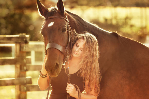 istock woman together with her horse 143919315