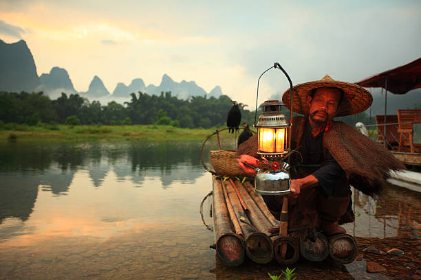 istock Lijiang fishermen 143919447