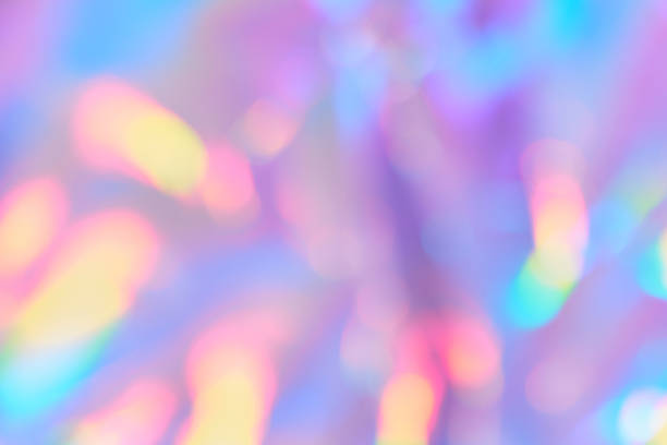 istock Soft gradient background with Smooth Blurred holographic iridescent colors with golden bokeh. Festive glittering background 1439196235