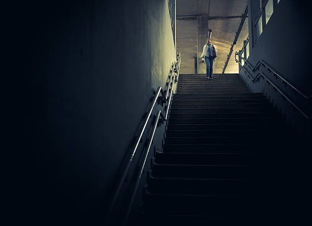 istock woman walking down the stairs 143919790