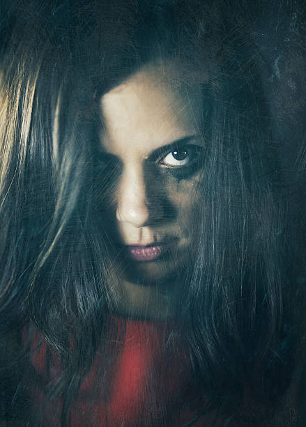 istock spooky young woman 143919834