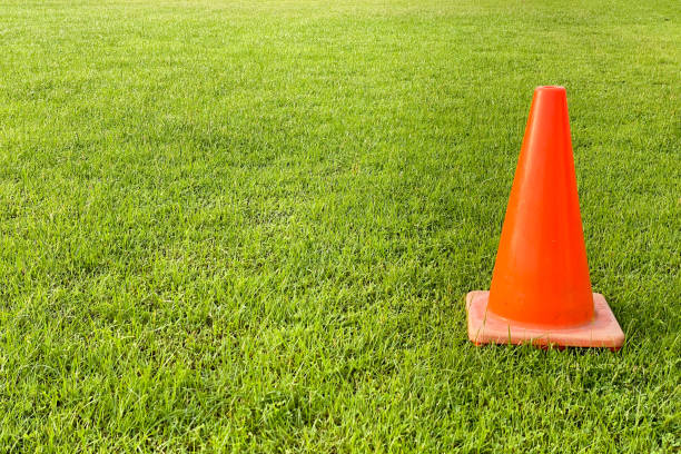 istock Orange cone on football fields 1439198346